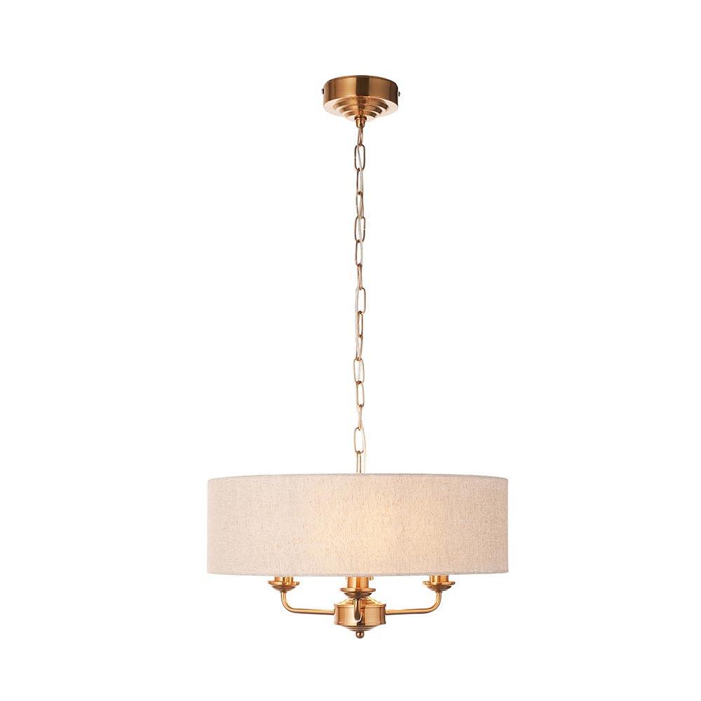 highclere aged brass 3 light pendant natural linen shade by Endon Lighting Living Room Close Up 23