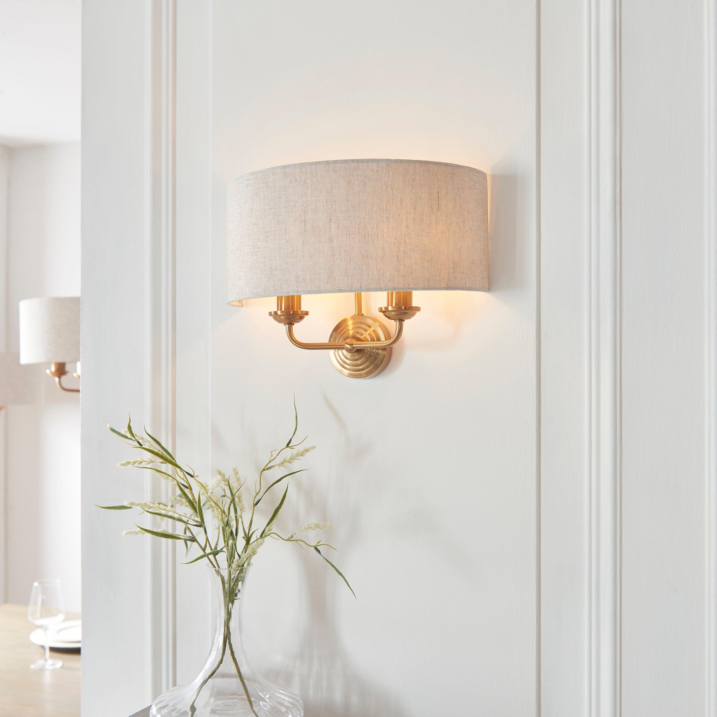 highclere brass wall light natural linen shade by Endon Lighting Living room image