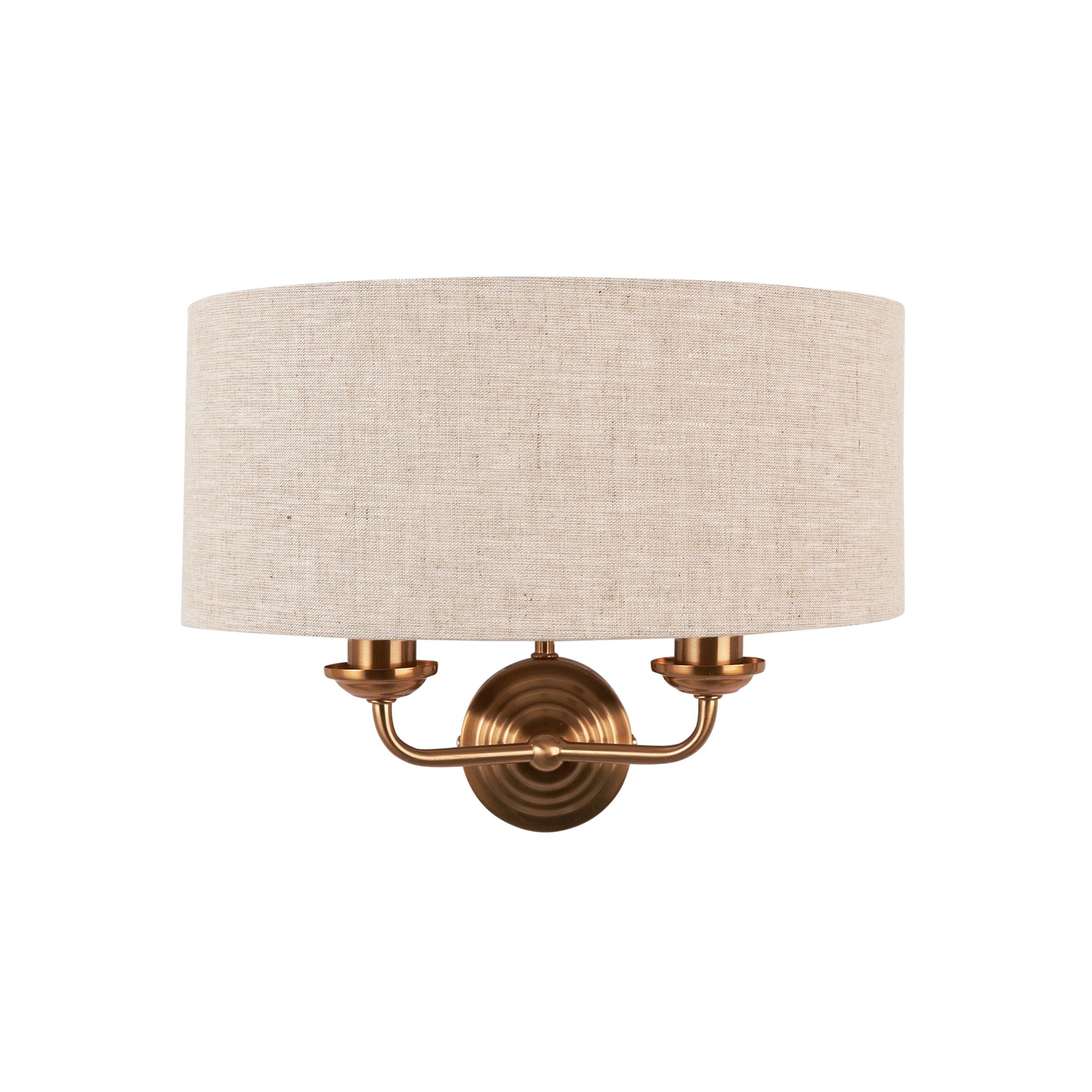 highclere brass wall light natural linen shade by Endon Lighting Living Room Family Shot