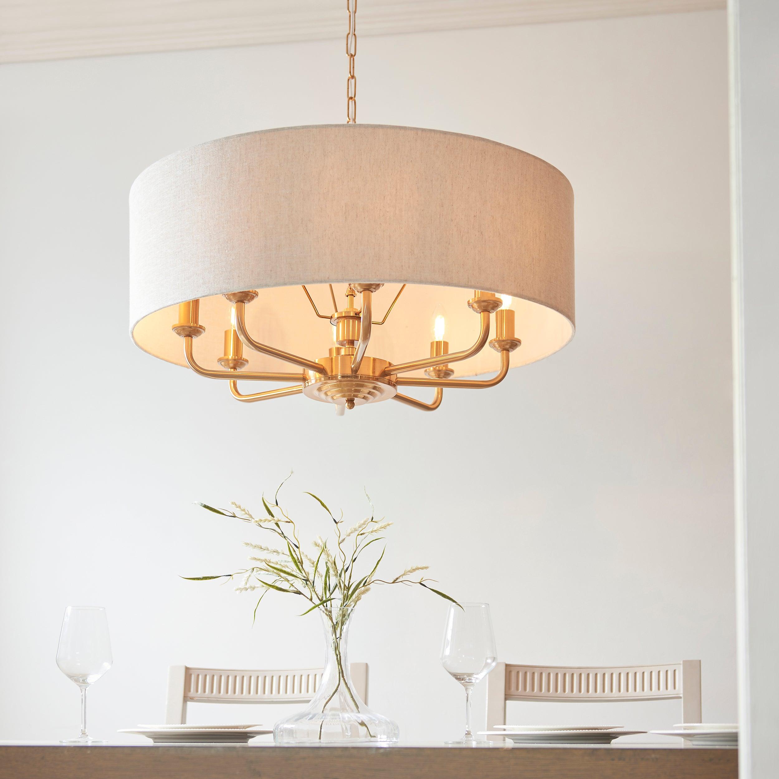 highclere vintage brass 8 light pendant linen shade by Endon Lighting Living Room Close Up 17