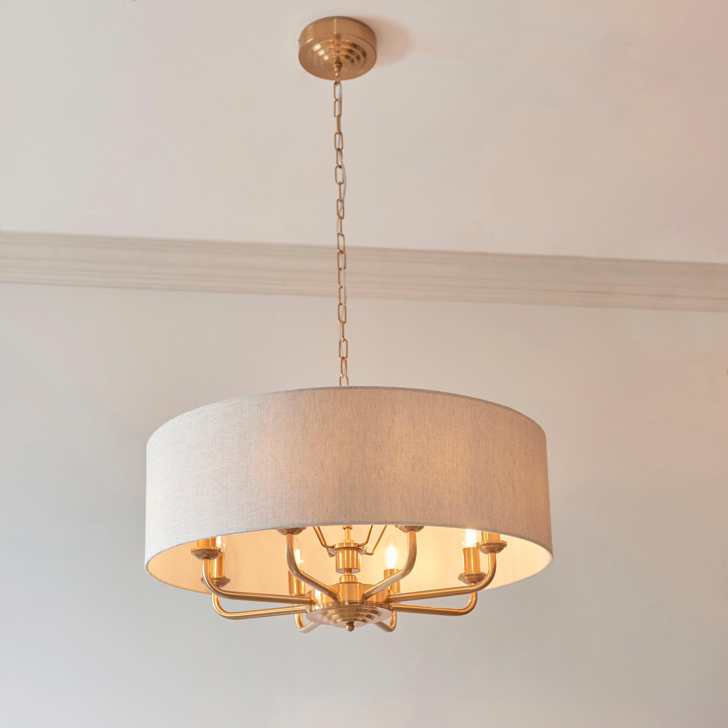 highclere vintage brass 8 light pendant linen shade by Endon Lighting Living room image