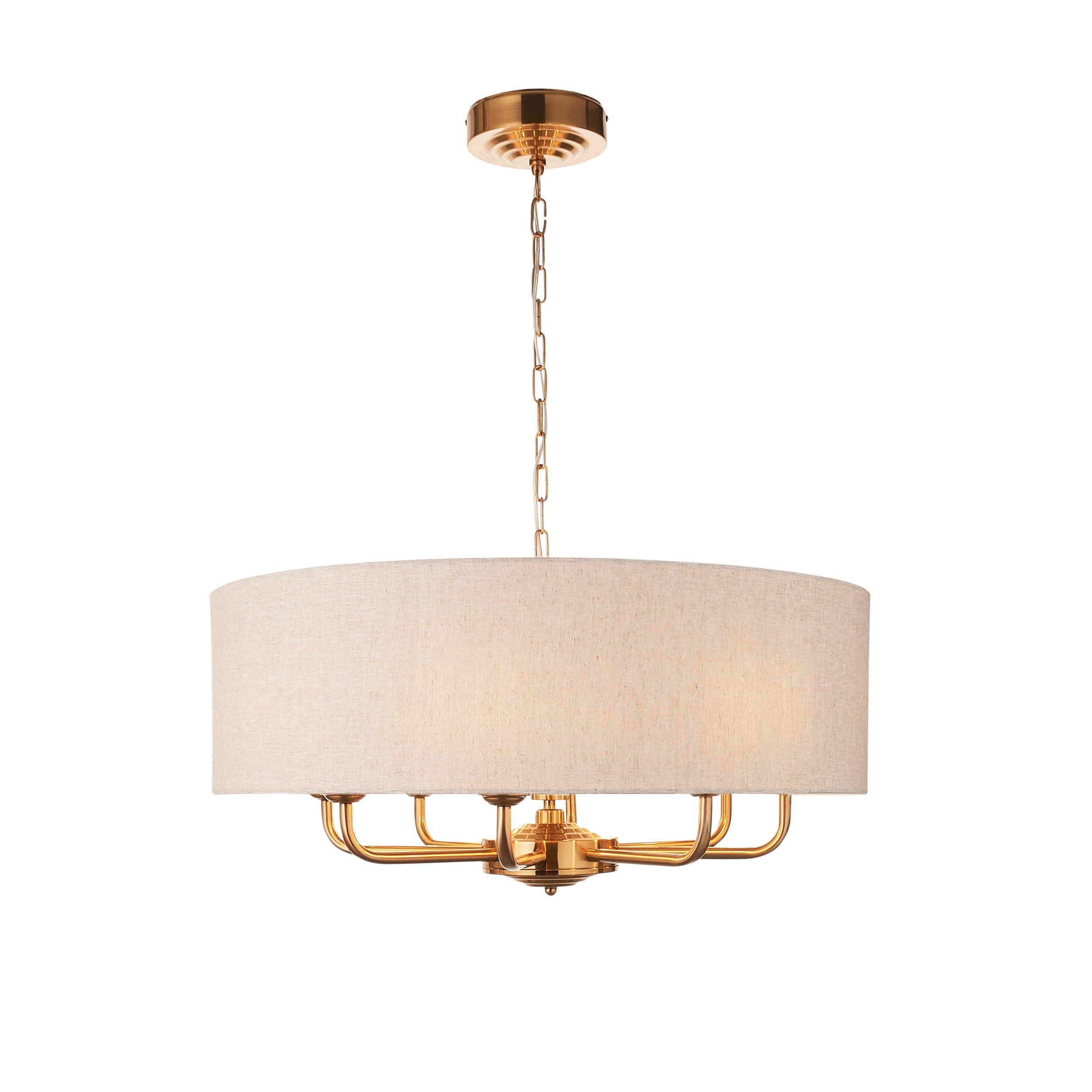 highclere vintage brass 8 light pendant linen shade by Endon Lighting Living Room Family Shot