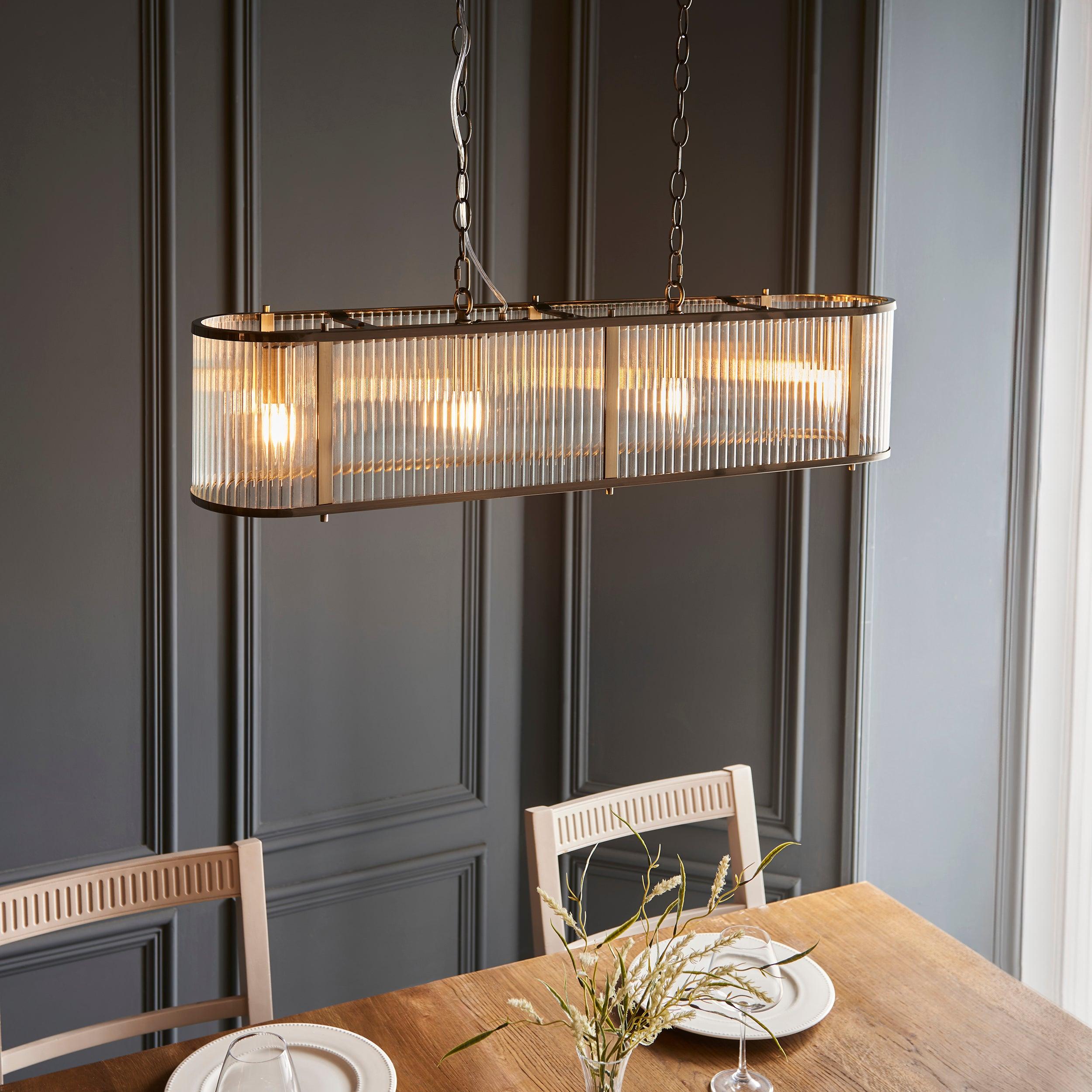 Ridgeton 4 Light Antique Brass & Ribbed Shade Glass Linear Pendant-OPEN-BOX-040626