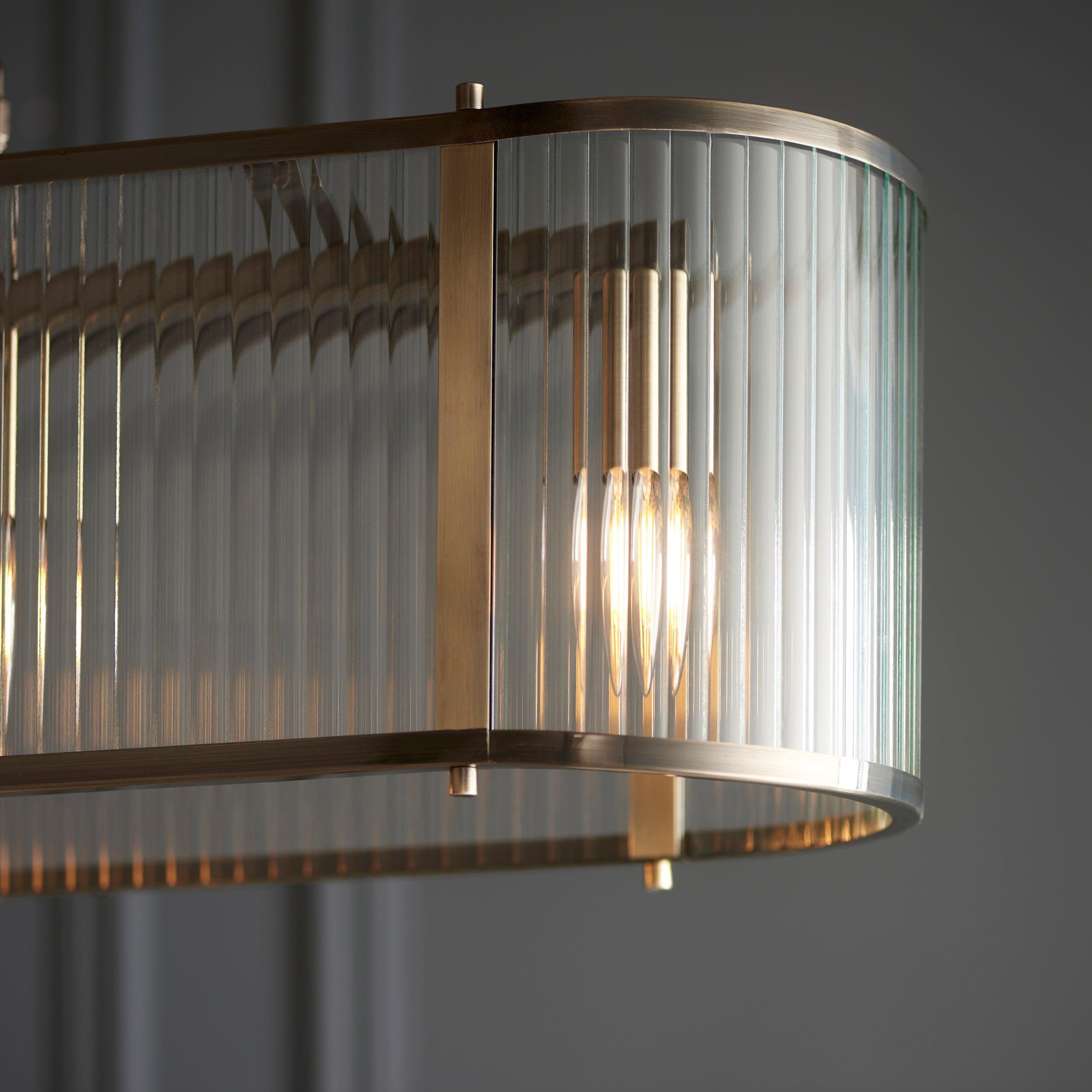 ridgeton 4 light brass ribbed shade glass linear pendant by Endon Lighting Living Room Unlit Shot