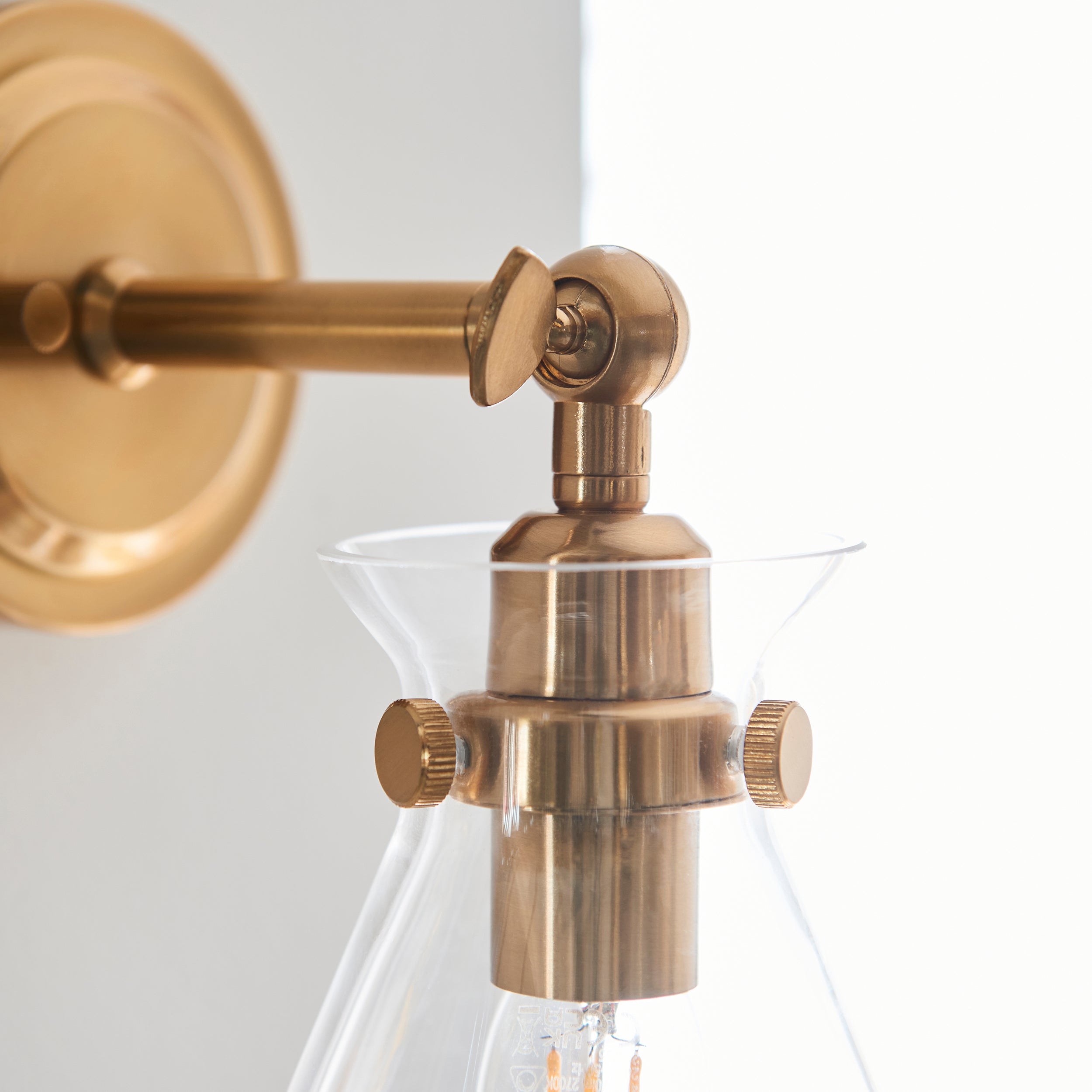 Harlow Brass Adjustable Wall Light by Endon Lighting
