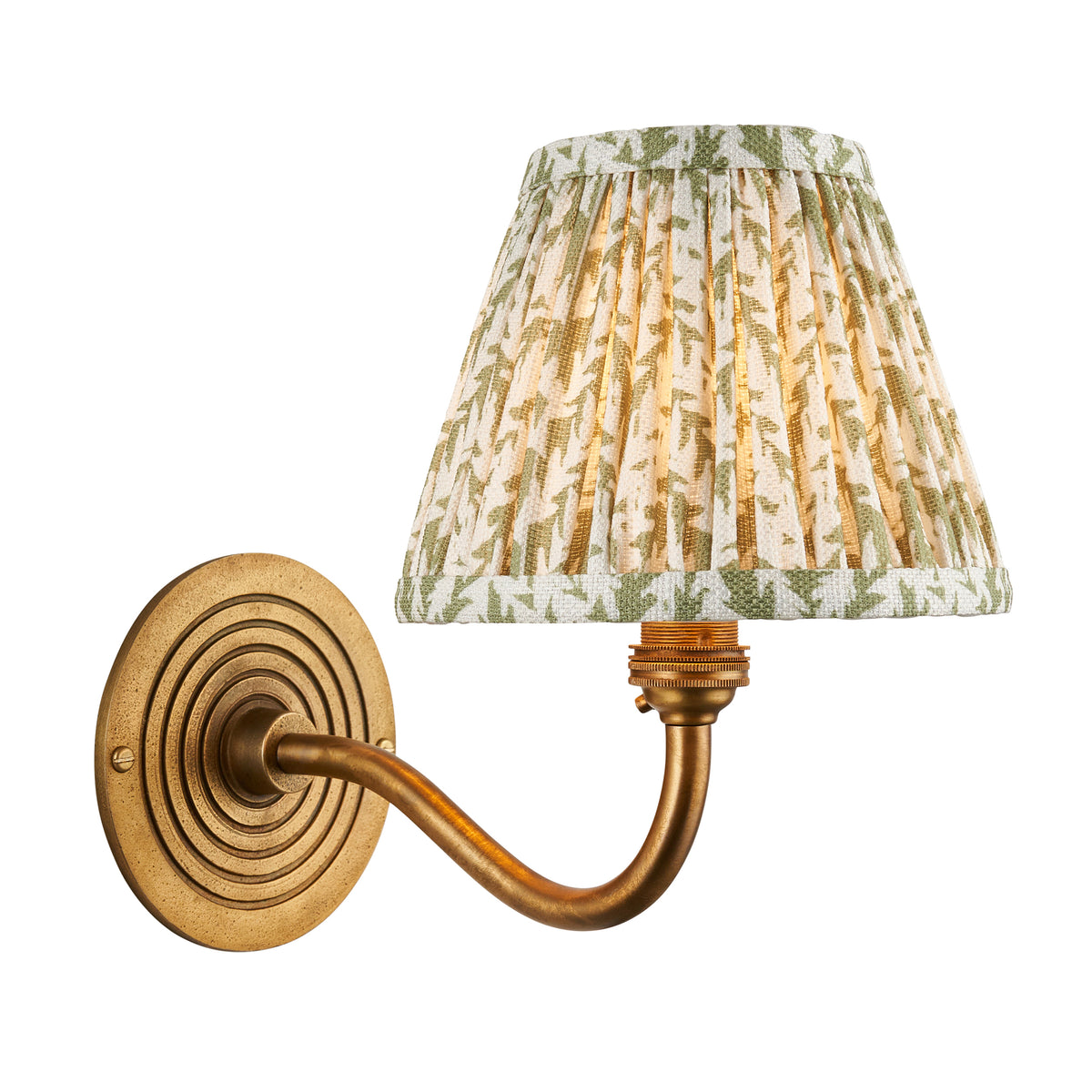 Ripple Curve & Leaf antique brass wall light with green leaf-print pleated shade on a ribbed round backplate
