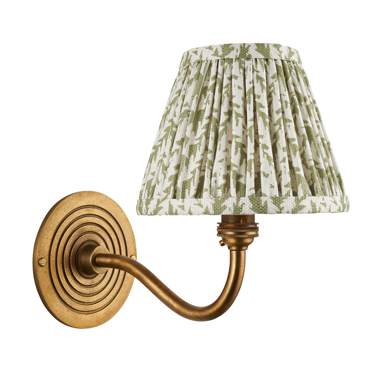 Ripple Curve & Leaf antique brass wall light with green leaf-print pleated shade on white background