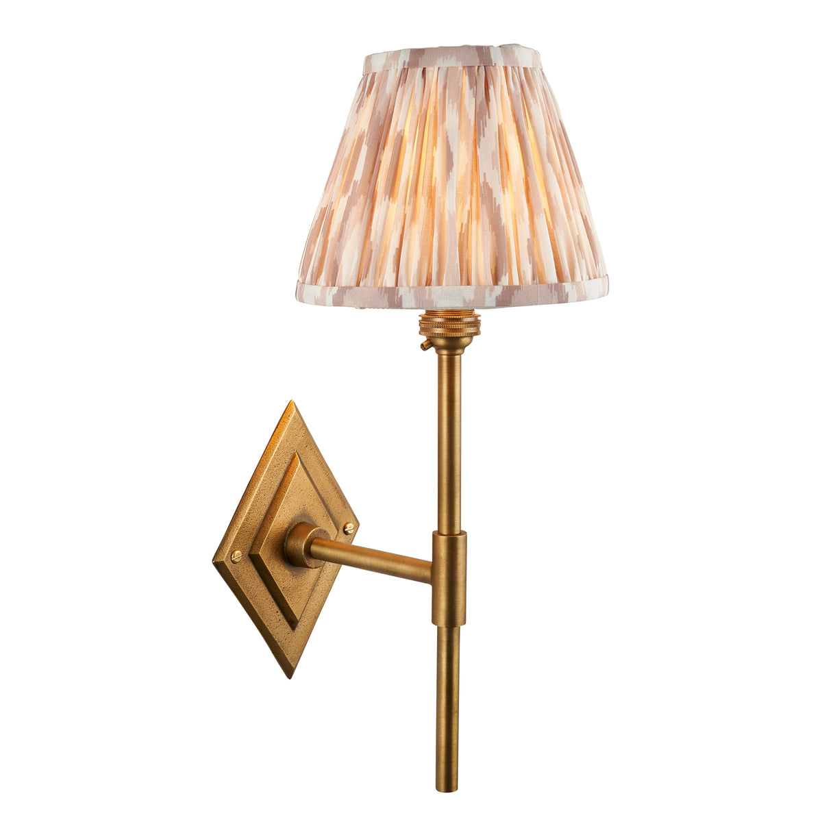 Diamond antique brass wall light with slim stem, diamond backplate and natural ikat pleated shade