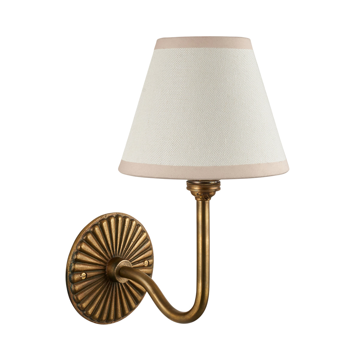 Dahlia Swan antique brass wall light with ivory linen shade, studio shot on white background
