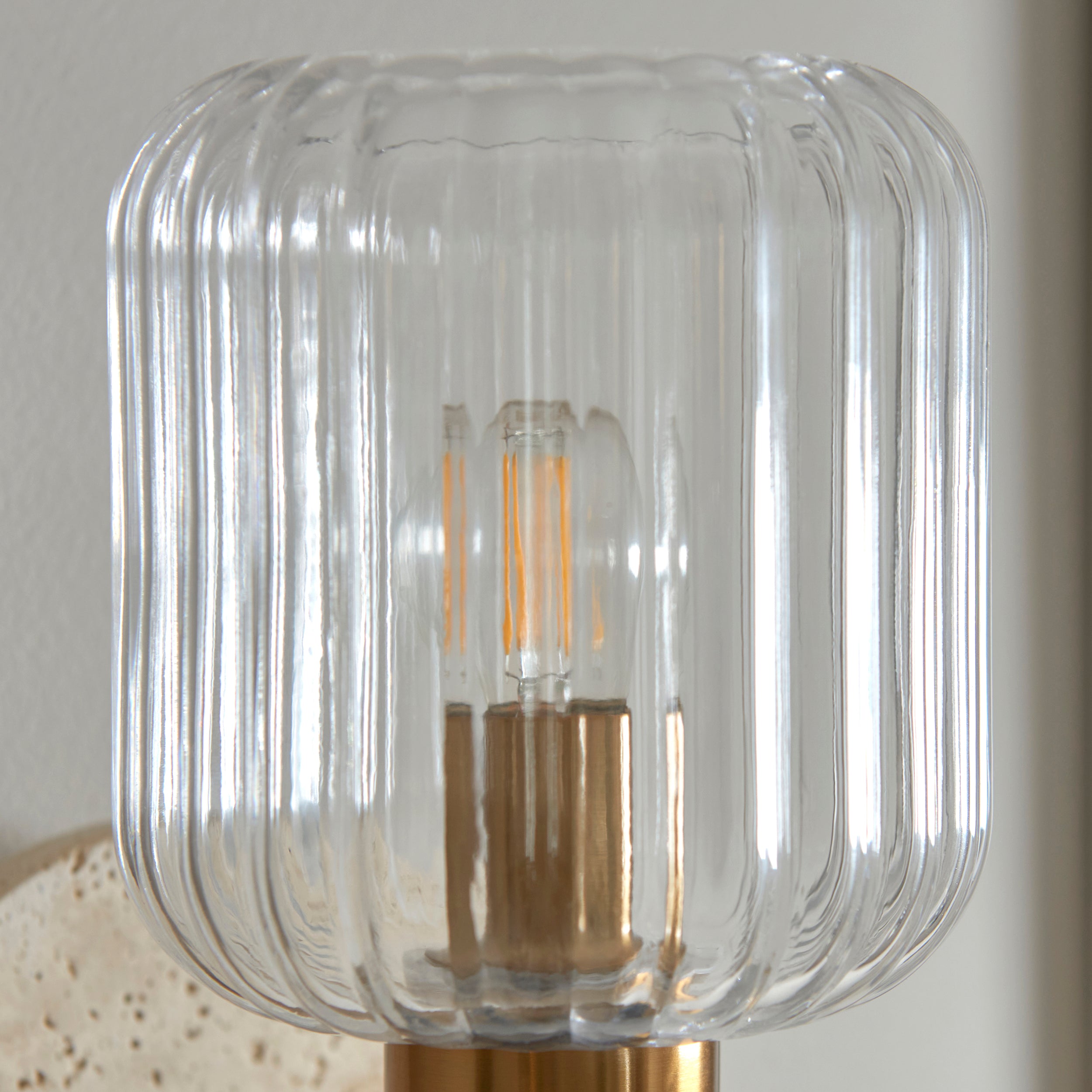 Travi Travertine Stone & Brass Wall Light - Glass Ribbed Shade