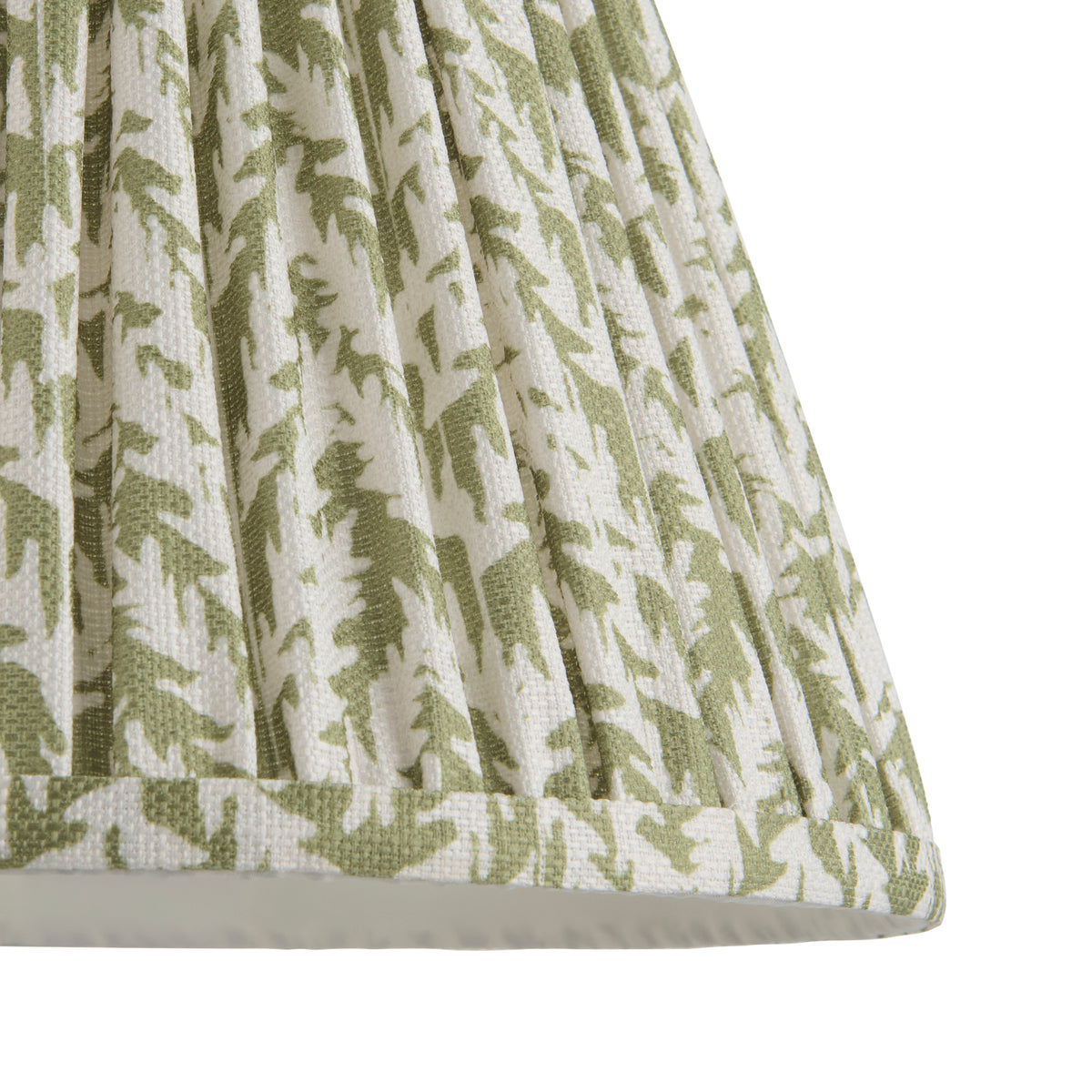 Detail of the pleated green leaf-print fabric and trimmed bottom rim of the Leaf Garden Green shade