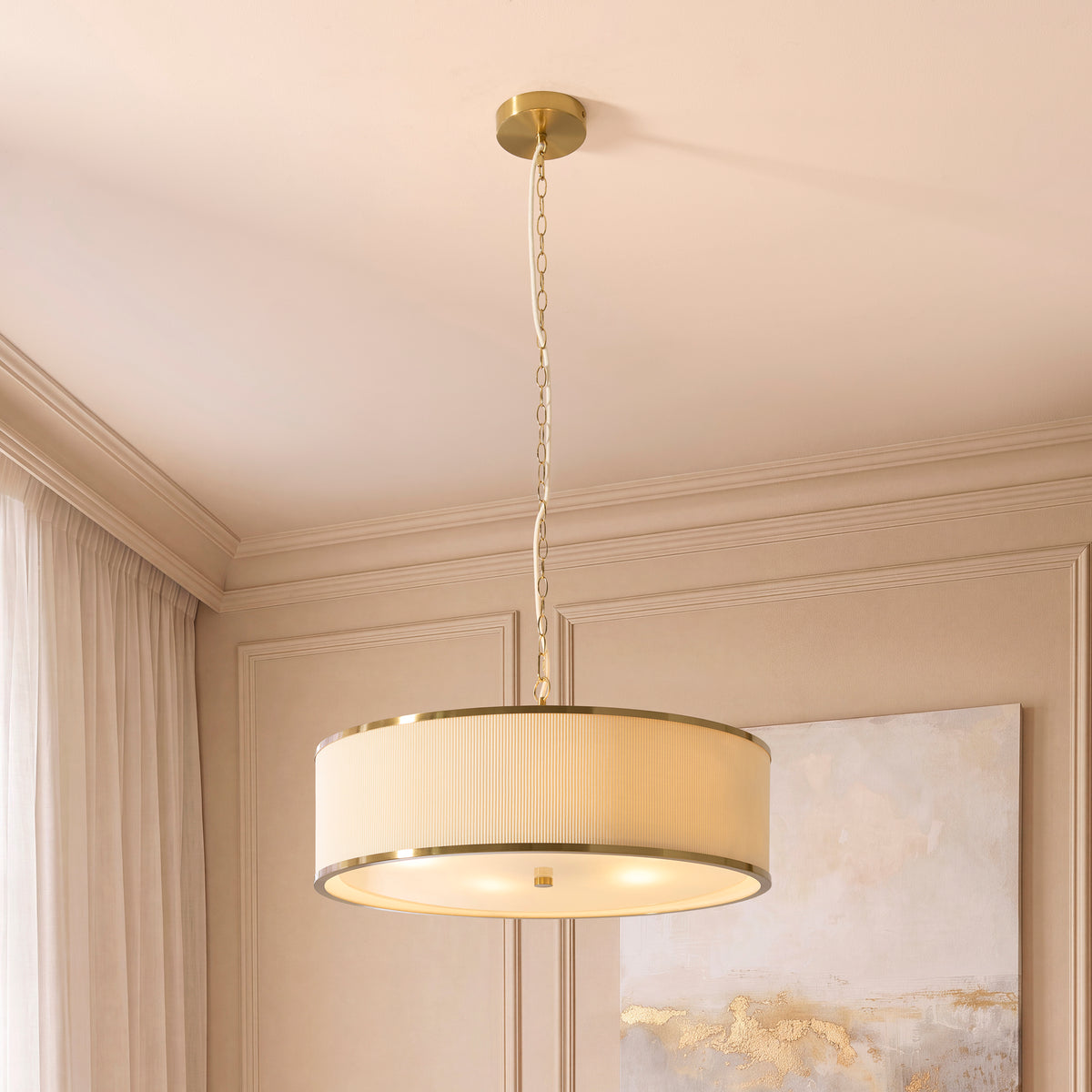 Lexi ivory drum pendant glowing in a neutral bedroom with panelled walls and coving