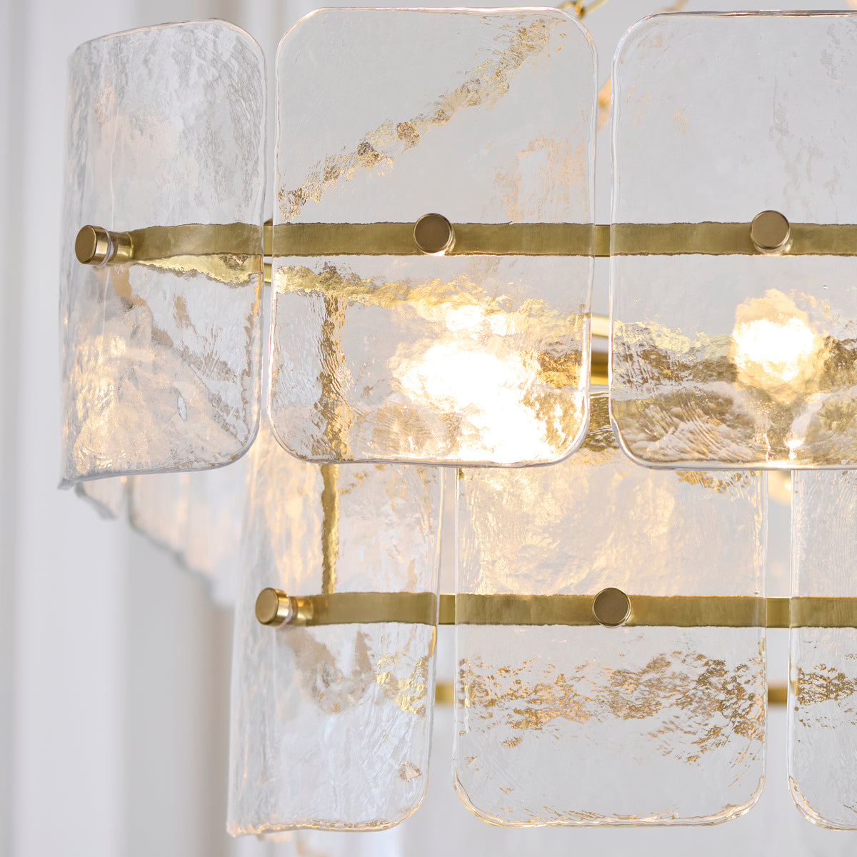Detail of the Venice pendant's rippled handmade glass panels lit from within
