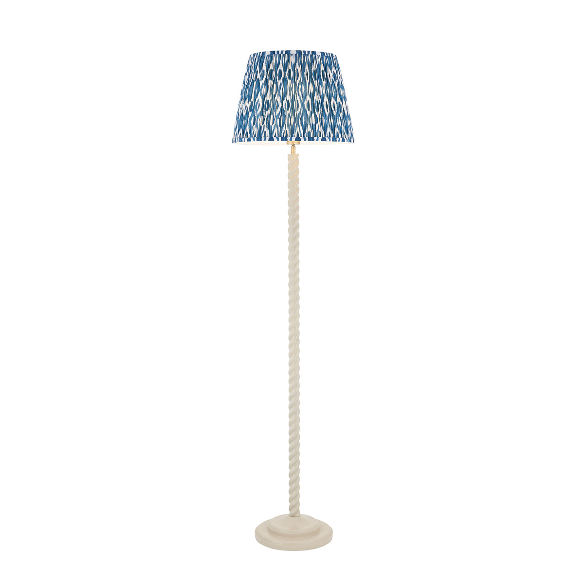 Twist & Ikat almond white floor lamp with a twisted stem and pleated blue ikat tapered shade
