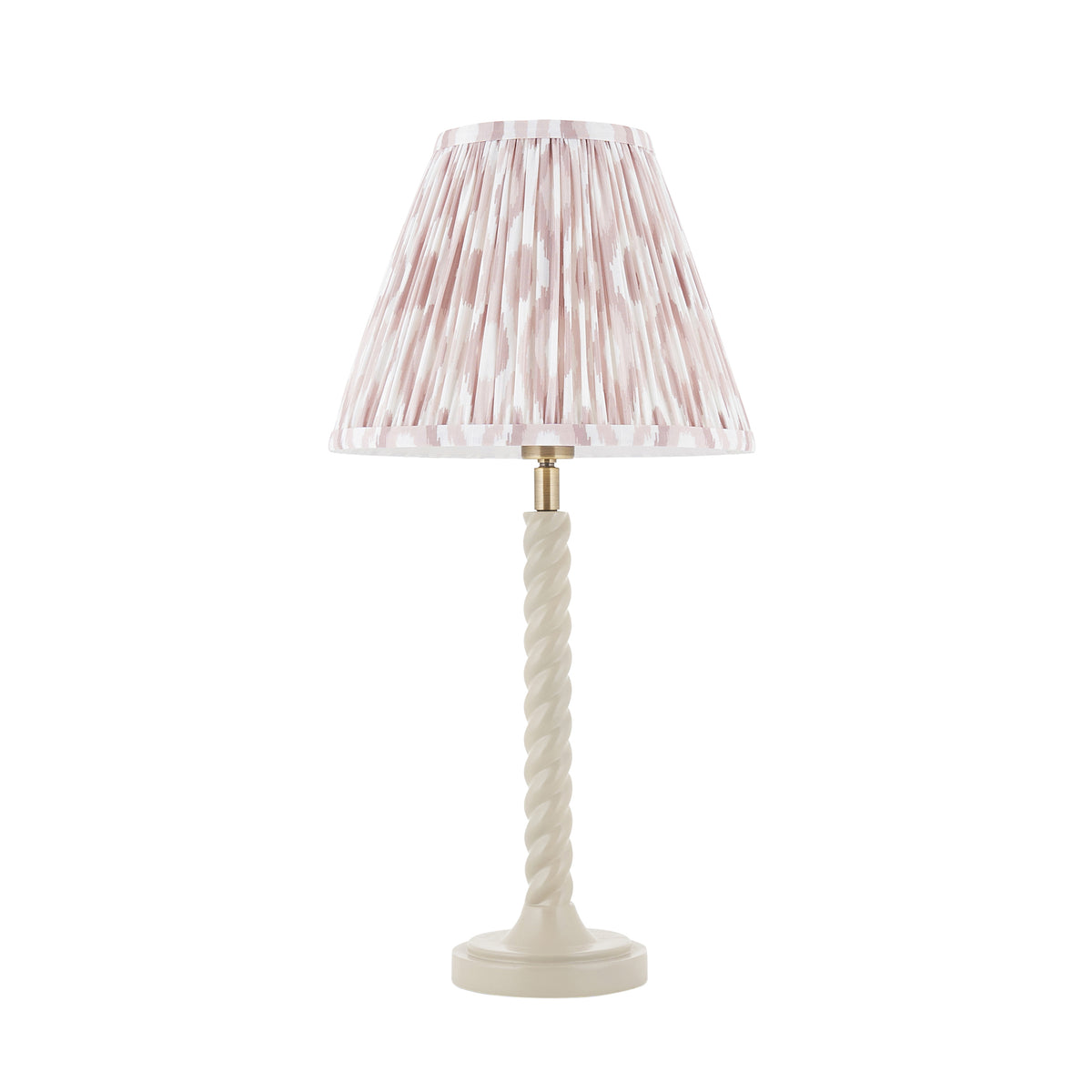 Twist & Ikat almond white table lamp with slim twisted stem and pleated ikat tapered shade
