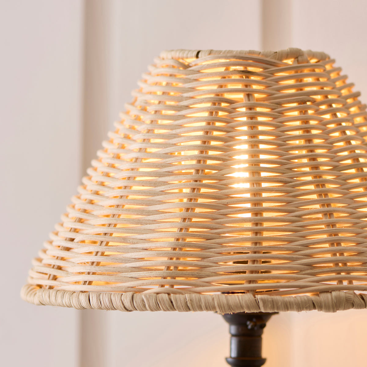 Detail of the pale natural rattan weave on the Jericho wall light shade