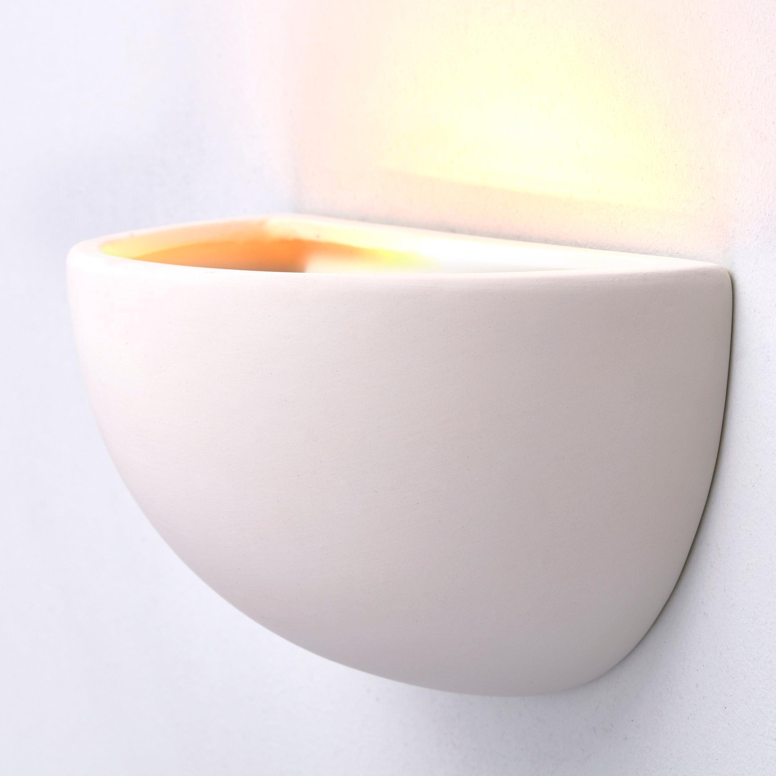 pride unglazed ceramic wall light by Endon Lighting Living room close up image