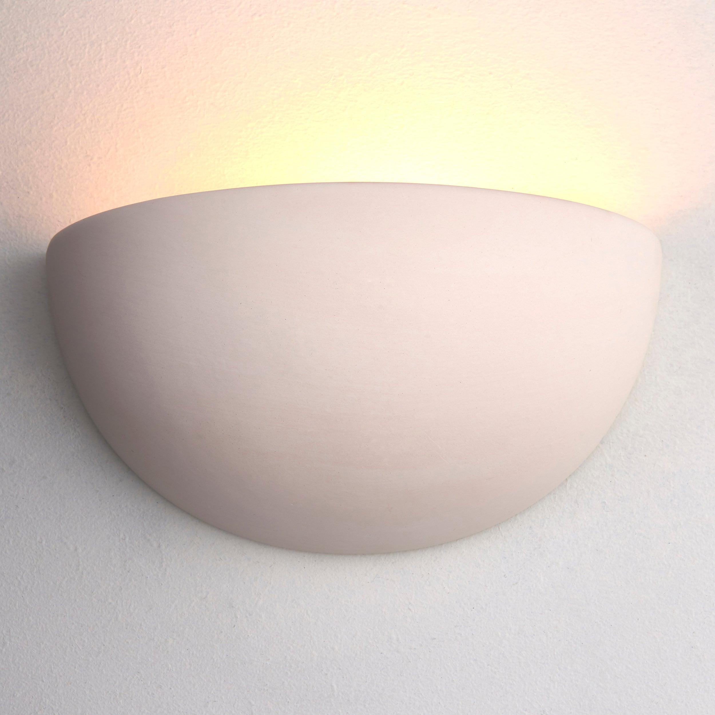 pride unglazed ceramic wall light by Endon Lighting Bedroom Close Up Image
