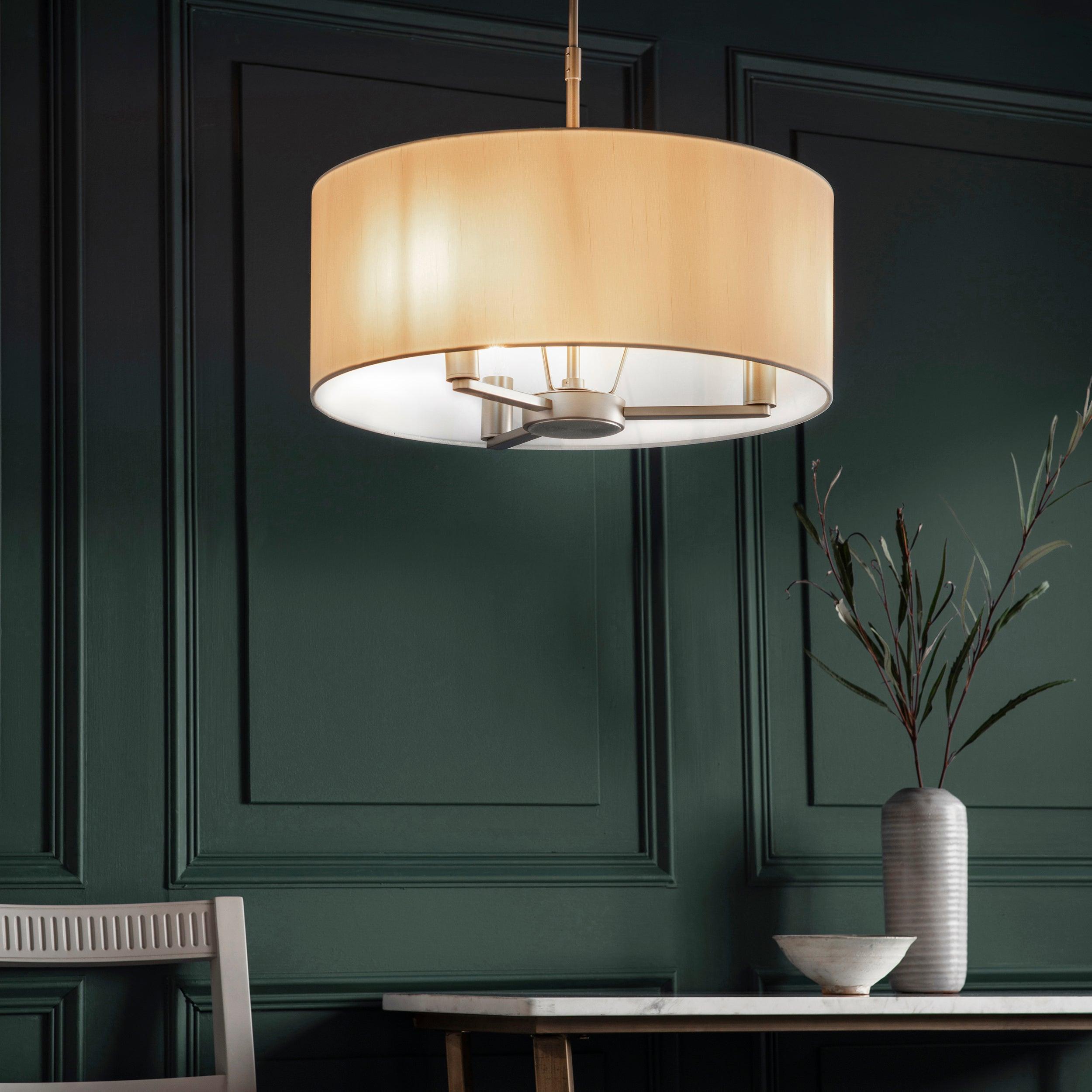 Endon Lighting Daley 3 Light Matt Nickel Pendant 60241 - Lifestyle showing light above a table lit up