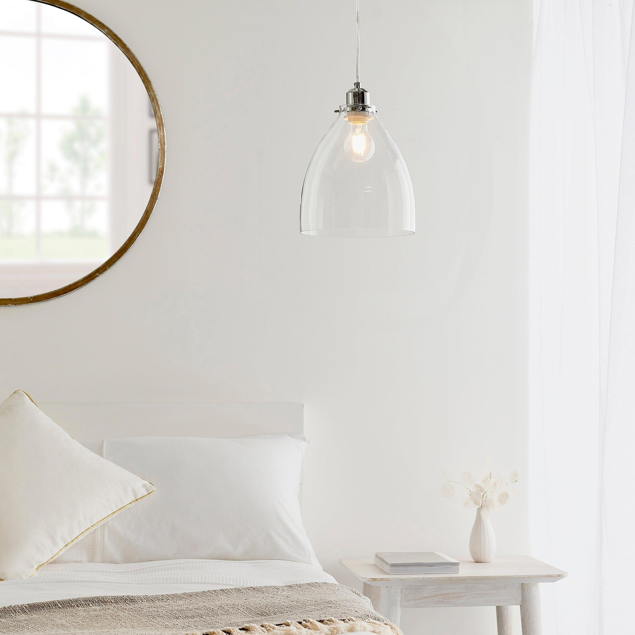 Elstow Glass & Chrome Easy Fit Ceiling Lamp Shade - above a bed in a bedroom