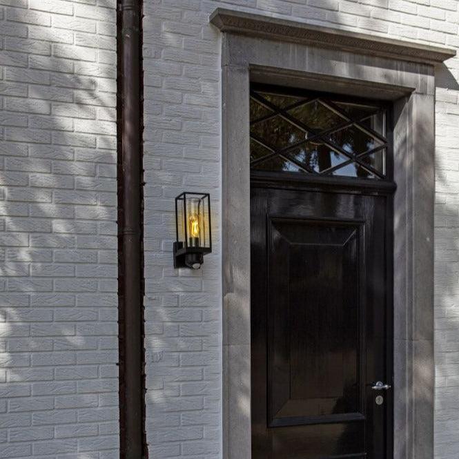 Lutec Flair Outdoor Wall Light With Camera & PIR - Black 5288811012 outside a door