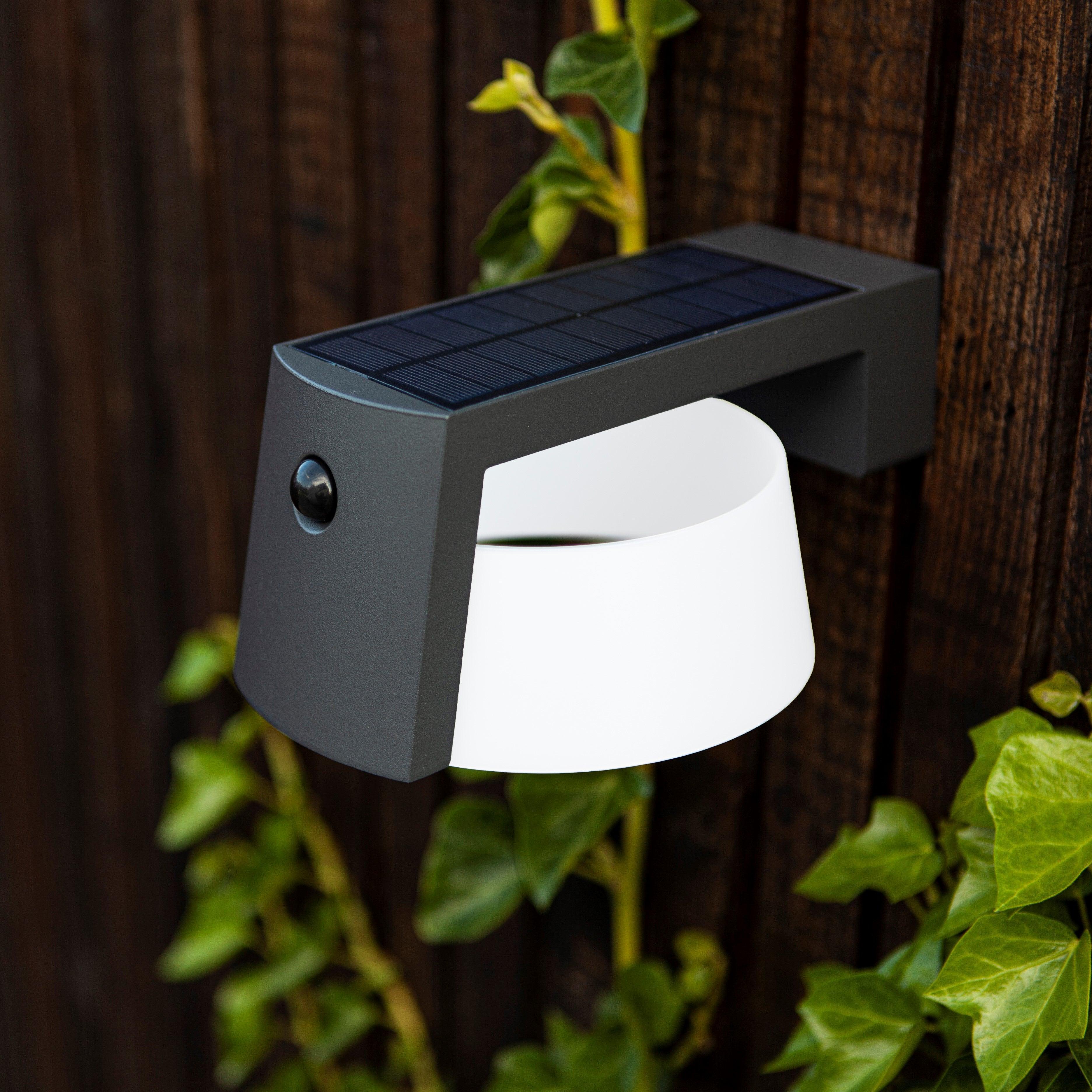 Lutec Moon Solar PIR Outdoor Led Wall Light In Dark Grey 6906001118 - Garden shot