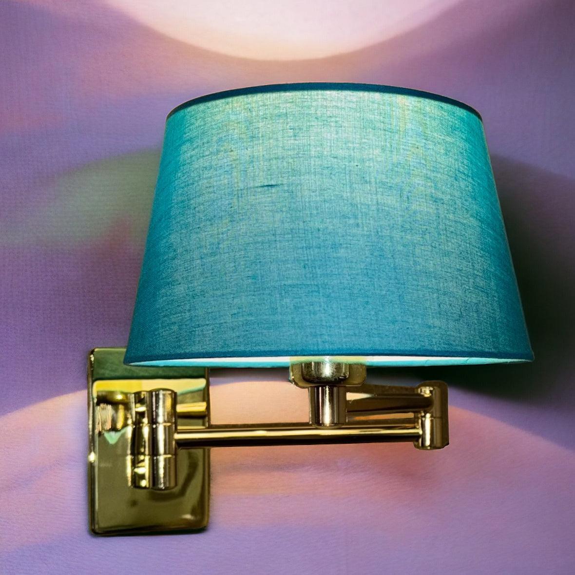 armada polished brass finish double swing arm wall light room image close up