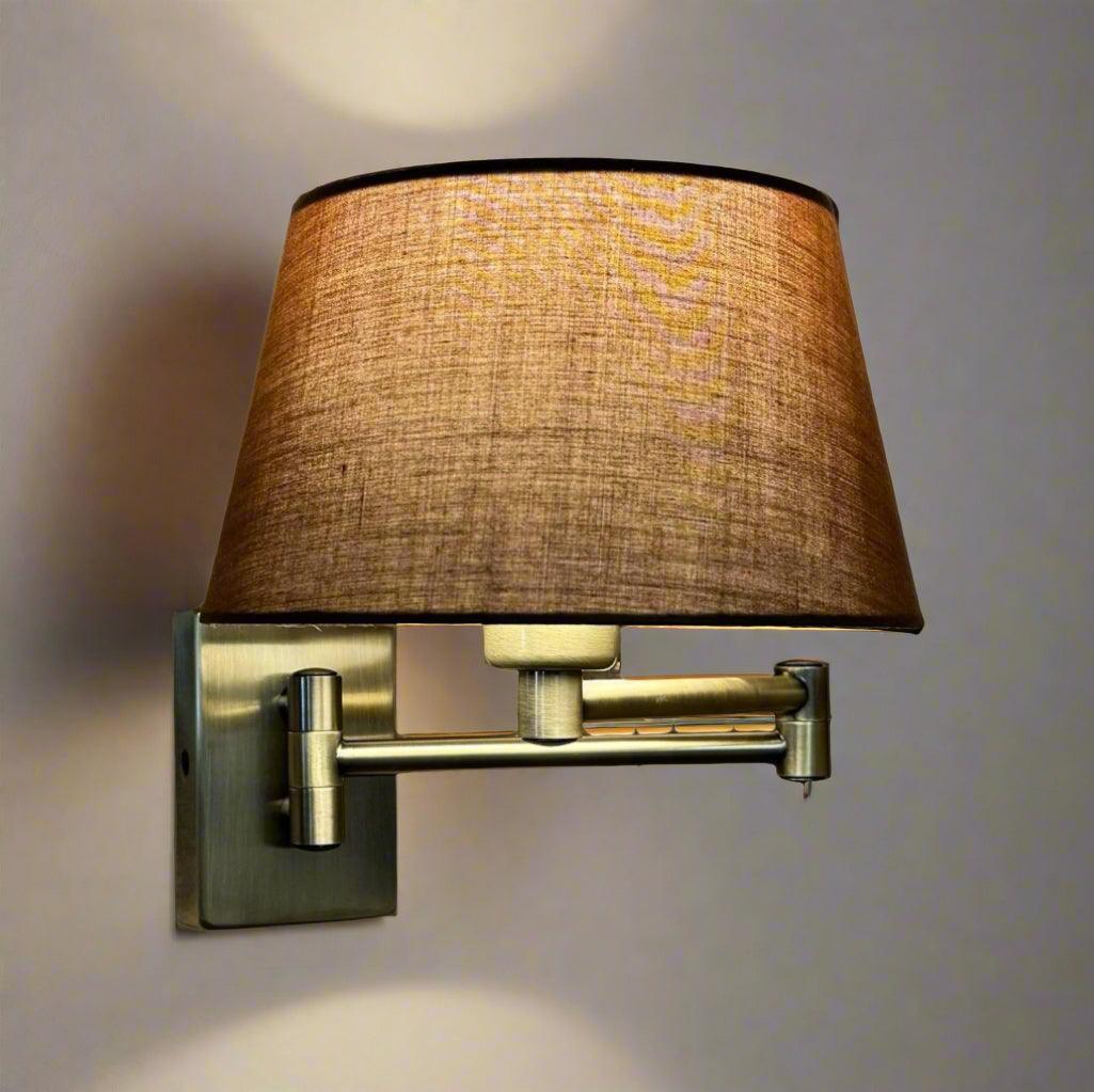 armada antique brass swing arm wall lamp TIffany Lighting Image