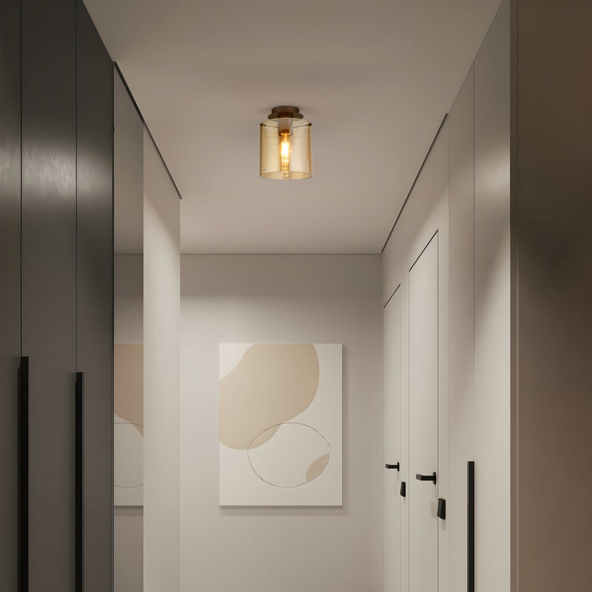 Sweden mocha flush ceiling light in a narrow hallway with grey wardrobes and abstract art