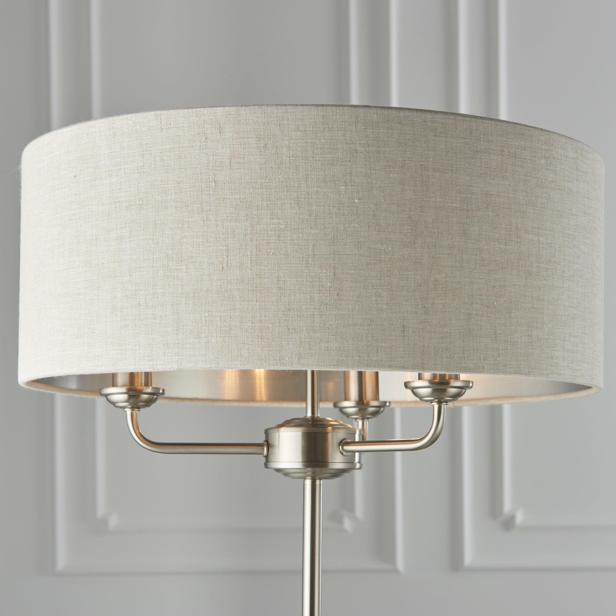 highclere brushed chrome floor lamp linen shade by Endon Lighting Living Room Unlit Shot
