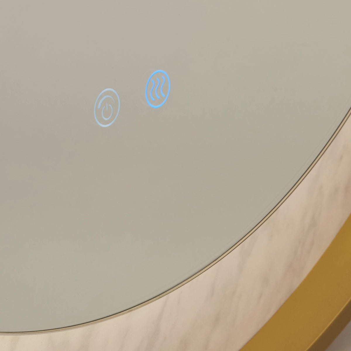 Close-up of the Luxo mirror's touch sensor controls on its illuminated marble-effect edge