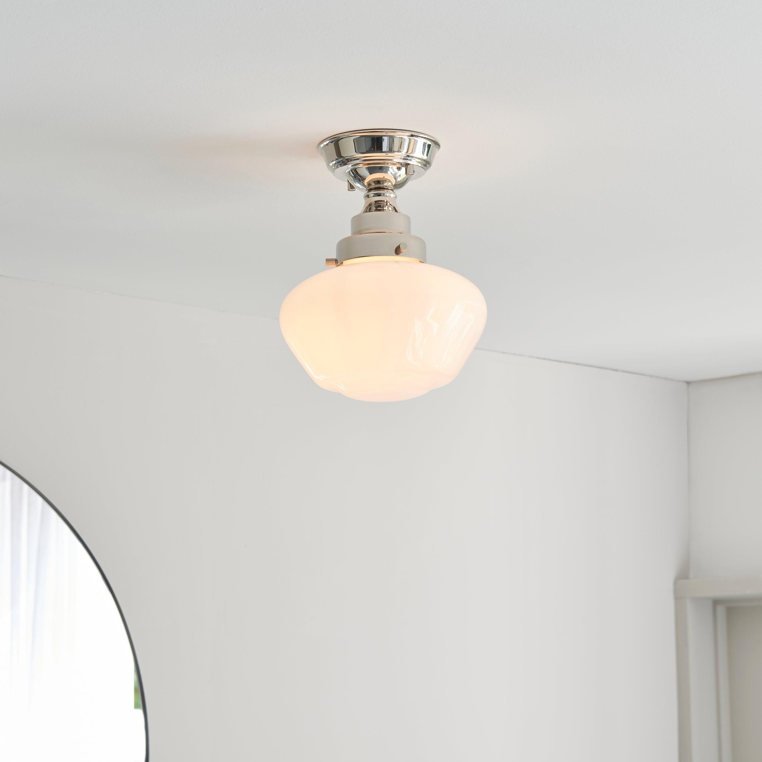 camberley semi flush school house chrome pendant with opal glass by Endon Lighting Living room close up image