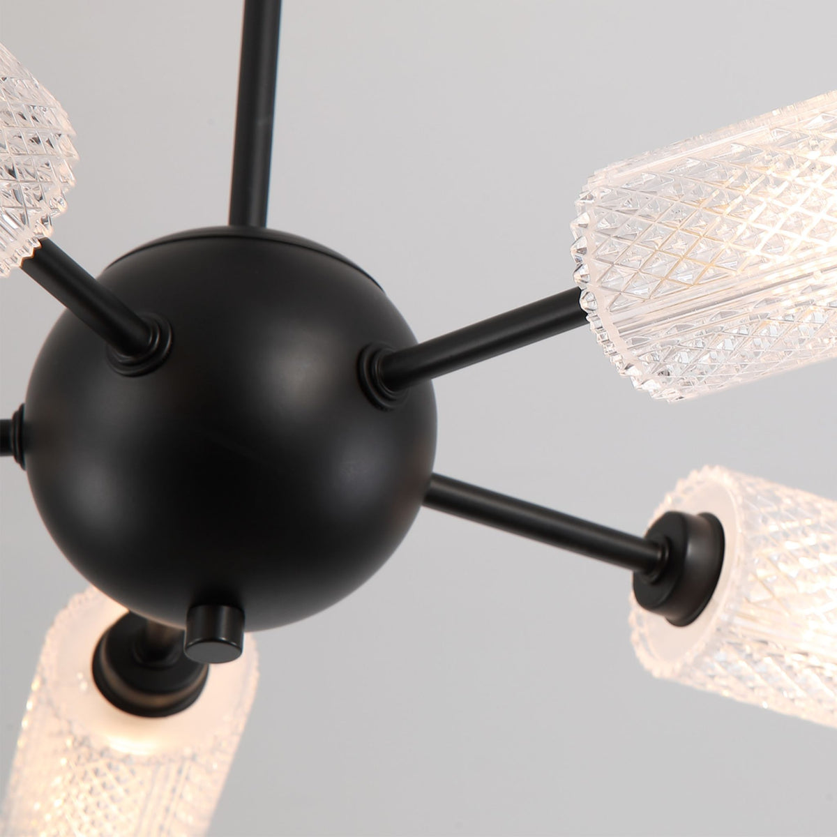 Detail of the Cosmic light's matt black ball hub and faceted clear acrylic tubes