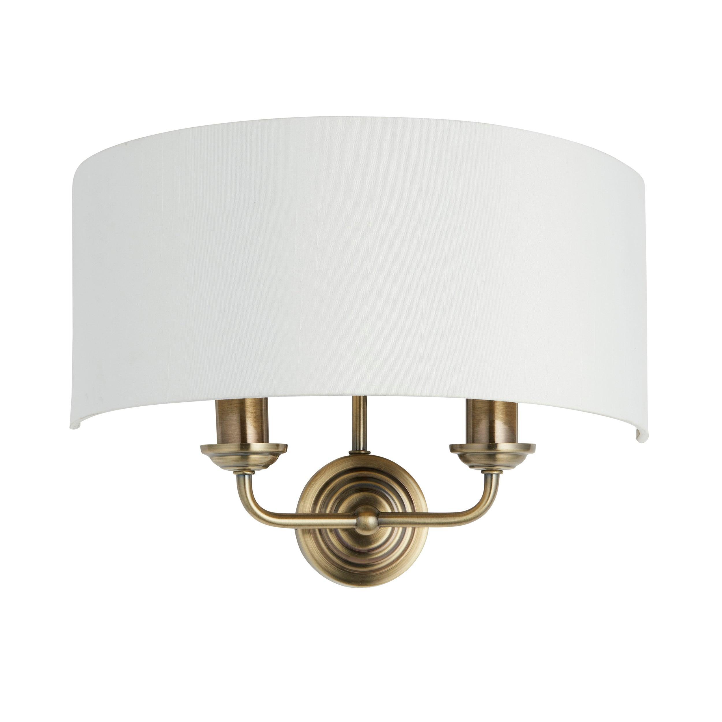 highclere brass finish wall light white shade by Endon Lighting Dining Room Close Up Image