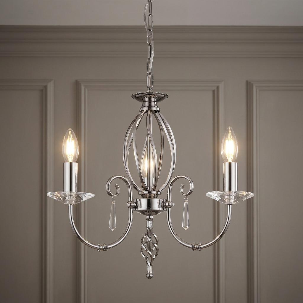 Aegean 3 Light Polished Nickel Chandelier with crystal droplets and curved arms against a paneled wall.