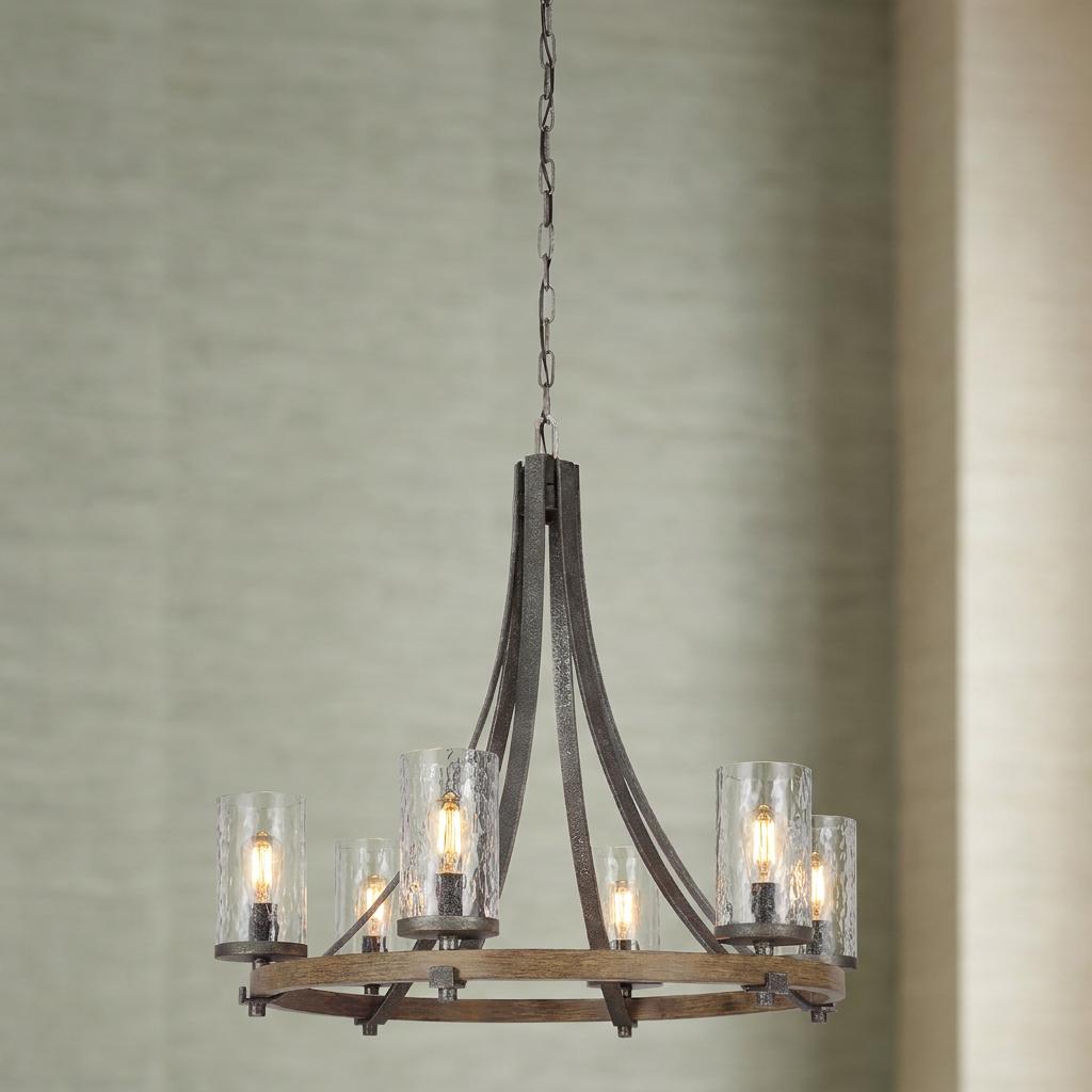 Angelo 6-light chandelier featuring a circular wood base, metal arms, and clear hammered glass shades.