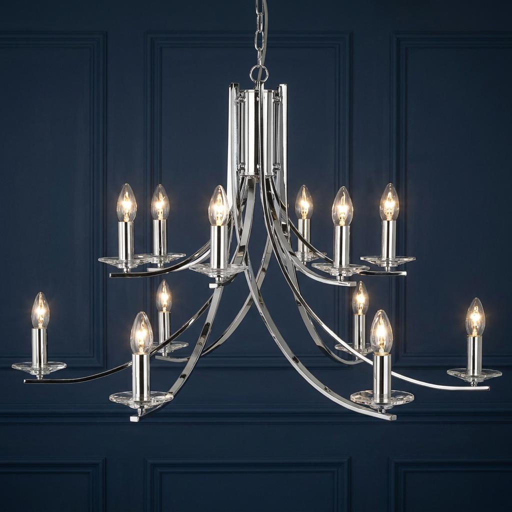 Ascona 12-light chrome chandelier with elegant curved arms and glass sconces on a dark blue paneled backdrop.