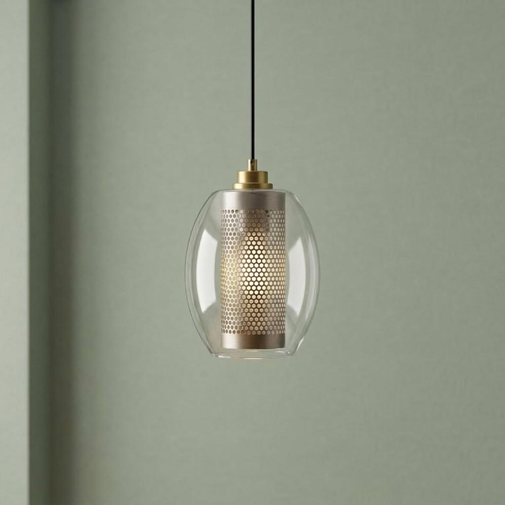 Mini ceiling pendant light with a clear oval glass shade and a perforated pewter inner cylinder.