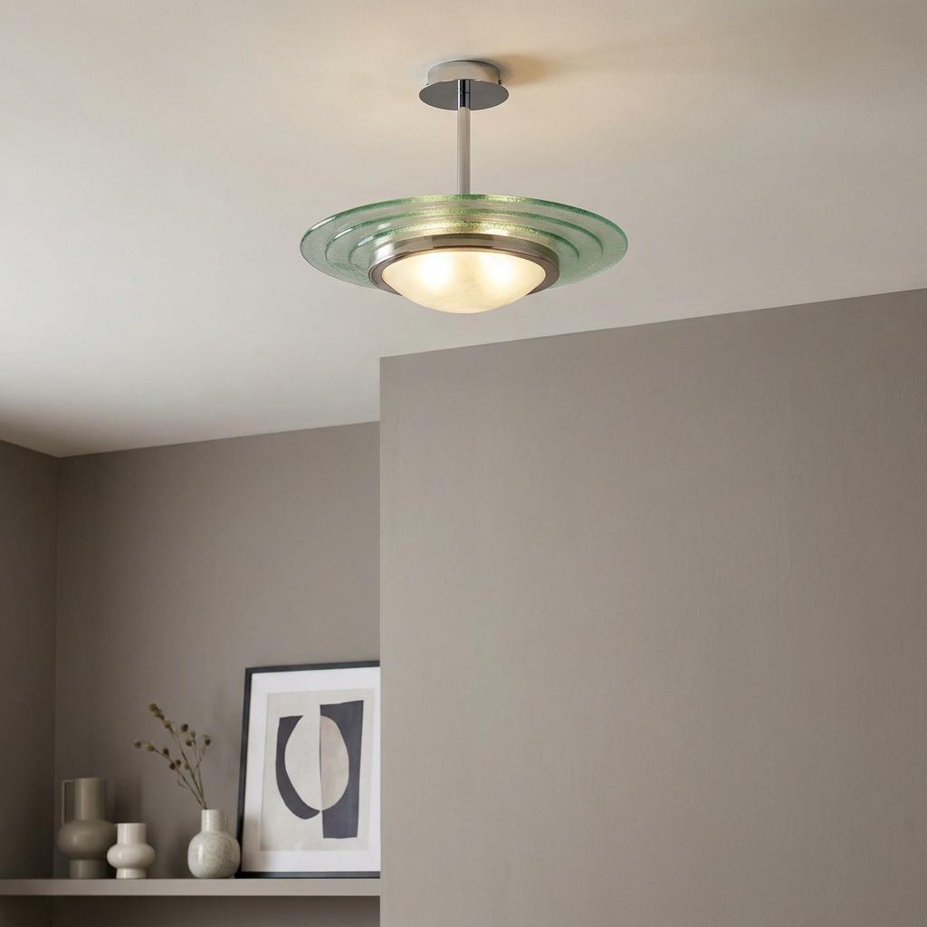 Art Deco semi-flush ceiling light with green tiered glass and chrome stem in a modern living space.