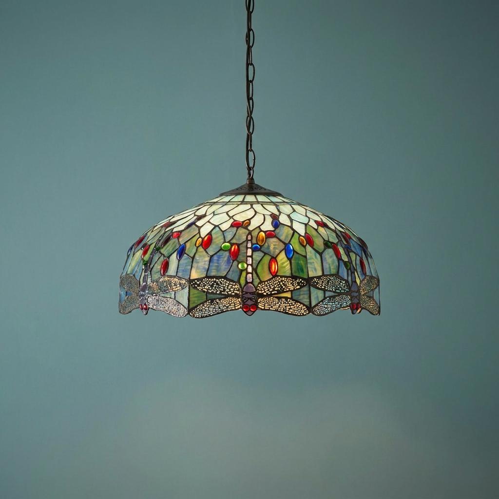 Large Tiffany ceiling light with a blue dragonfly stained glass pattern and colorful gems on a chain.