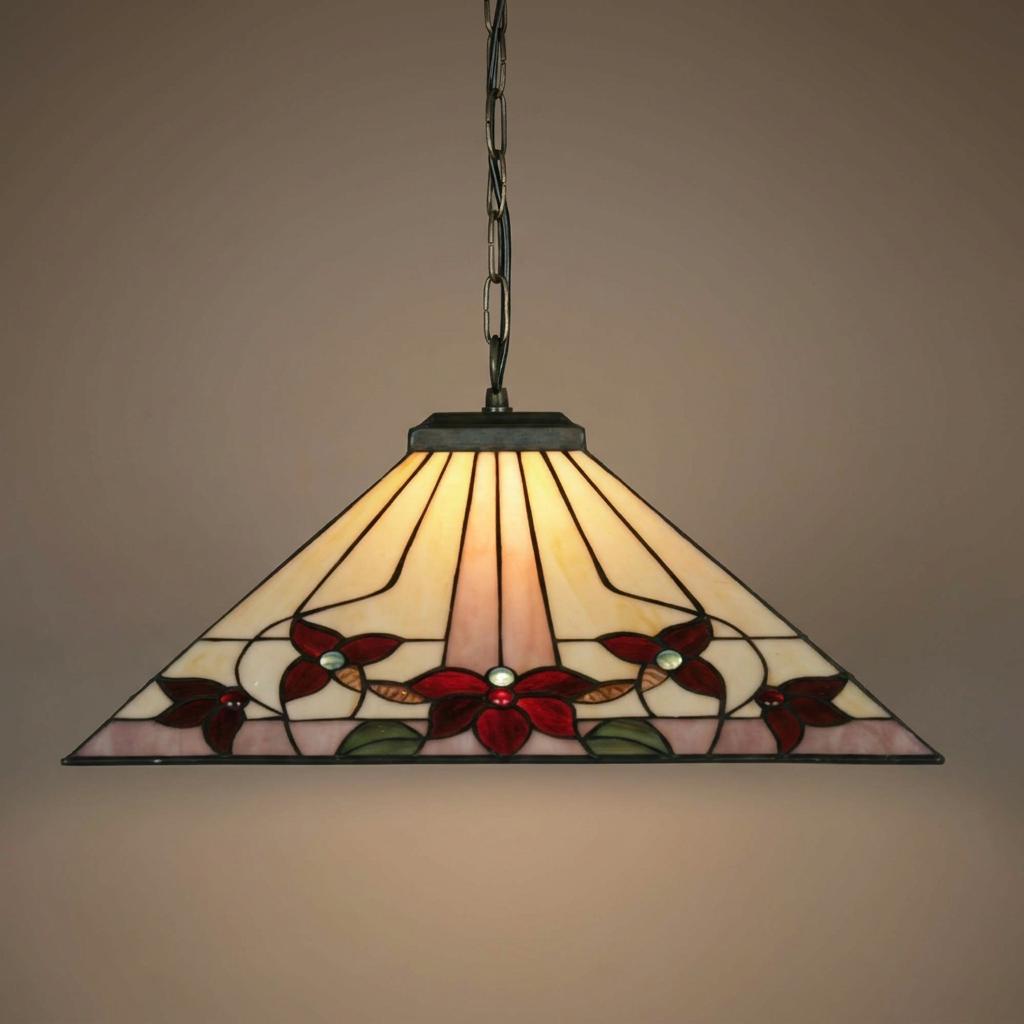 Tiffany-style pendant light with a triangular floral stained glass shade hanging from a bronze chain.