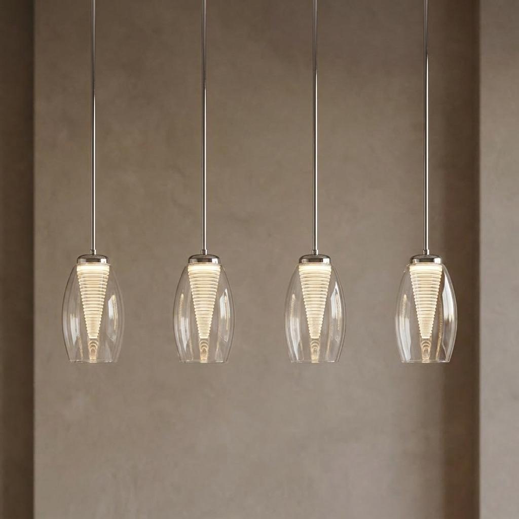 Four modern LED bar kitchen ceiling lights with clear glass shades and ribbed cones hanging against a neutral wall.