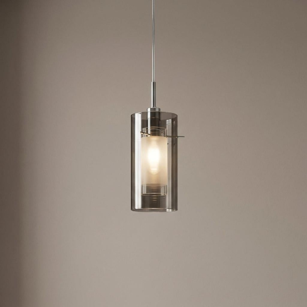 Modern ceiling pendant light with a smokey glass outer shade and a frosted inner cylinder.