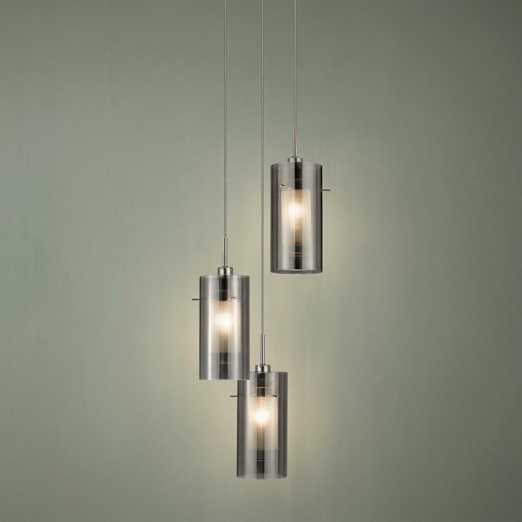 Modern three-light pendant featuring smokey and frosted glass cylindrical shades hanging at tiered heights.