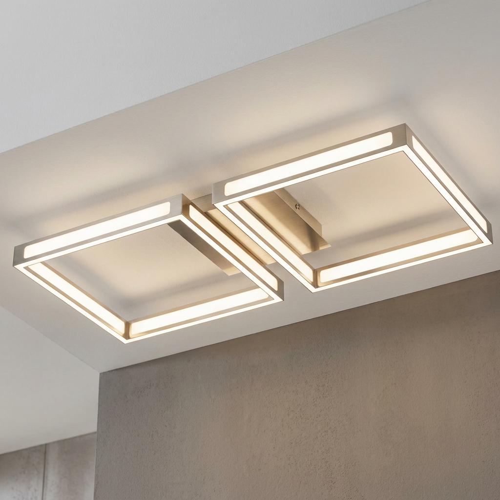 Modern flush ceiling light with two illuminated square nickel frames mounted on a white ceiling.