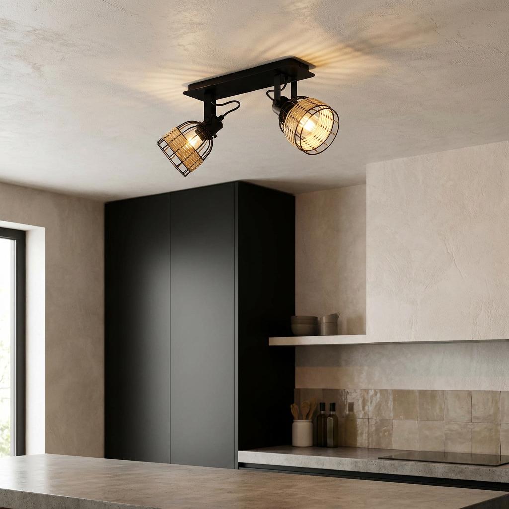 Two-light black and rattan spotlight fixture mounted on a modern kitchen ceiling with warm illumination.