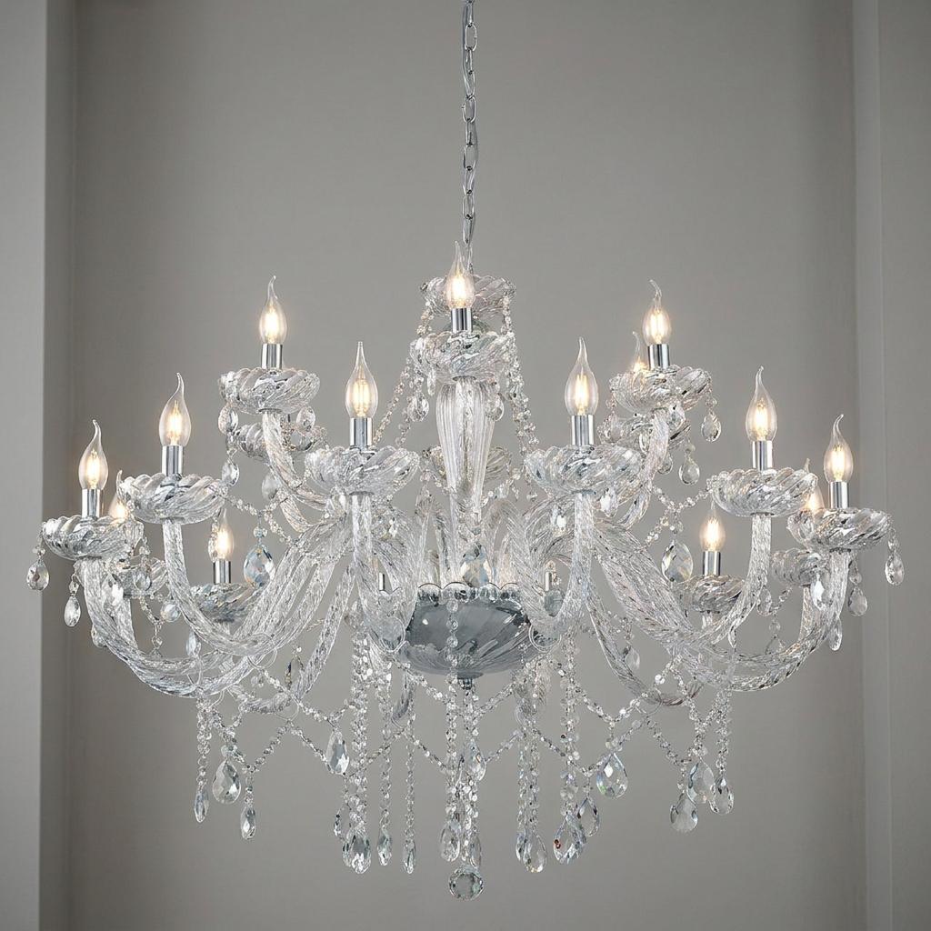 Eglo Basilano 1 18-light chandelier with clear glass arms and chrome accents against a neutral wall.