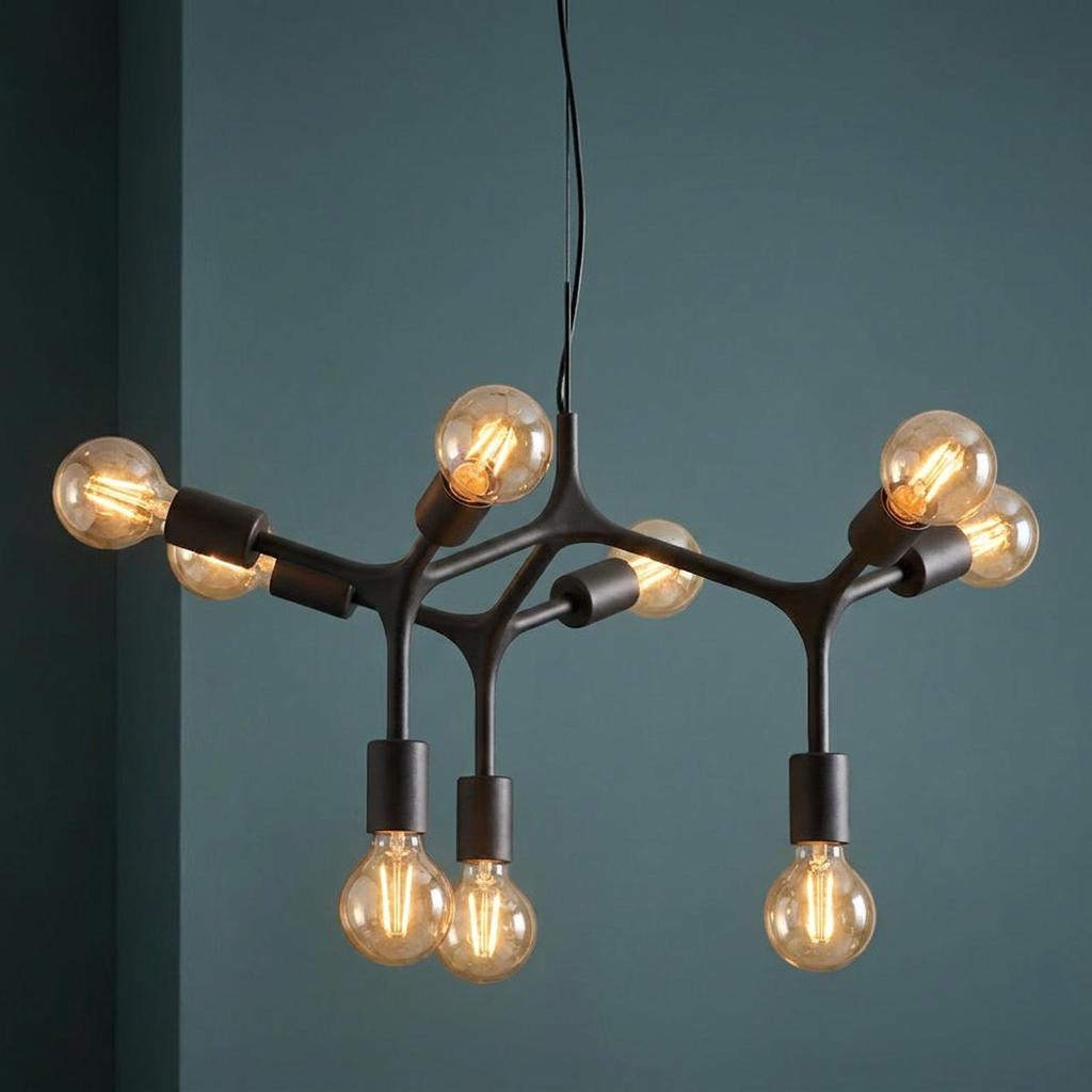 Eglo Bocadella 9-arm black metal ceiling pendant with warm filament bulbs against a dark teal wall corner.