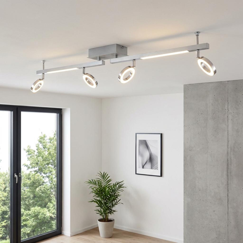 Eglo Cardillio chrome 4-light LED ceiling track spotlight with adjustable ring heads in a modern interior.