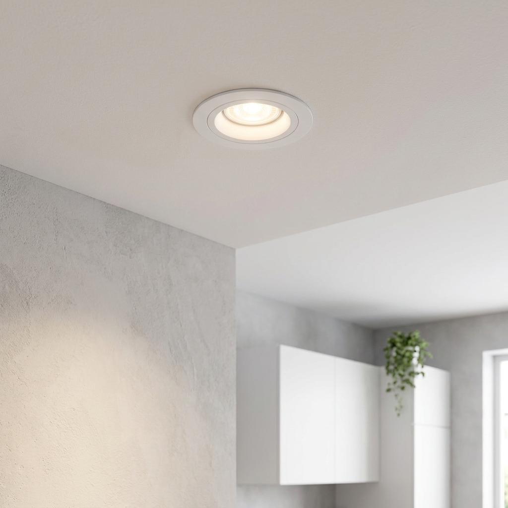 Eglo Carosso white round recessed spotlight illuminating a modern ceiling.